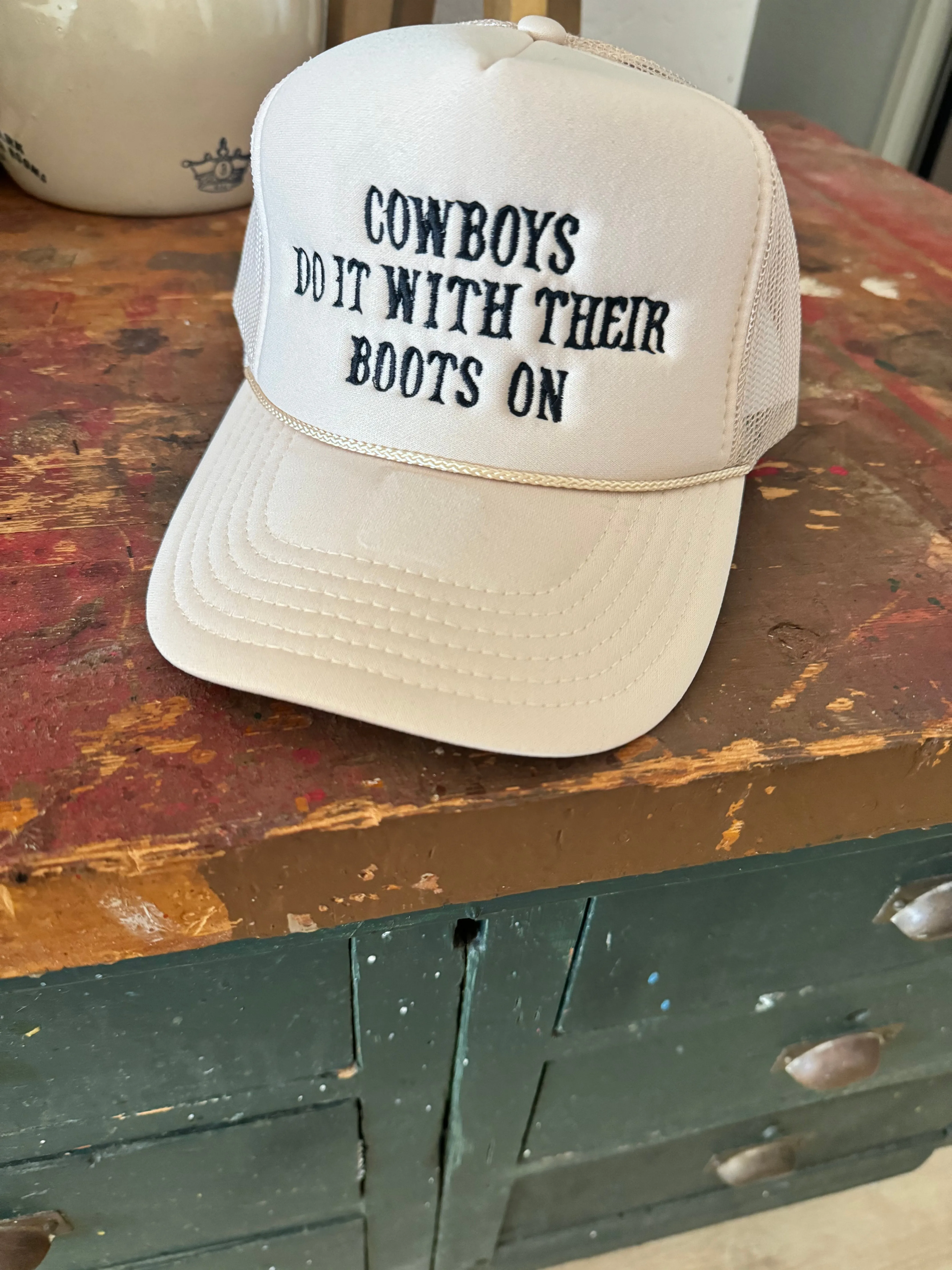 Cowboys Do It With Their Boots On Embroidered Trucker Hat